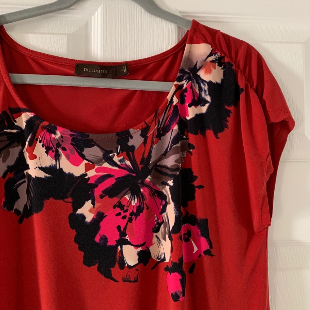 Red floral blouse